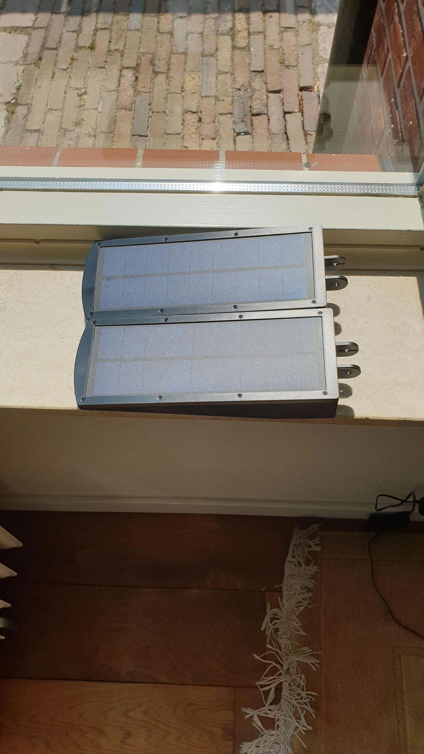 Solar wandlamp Paddle met bewegingssensor in zwart
